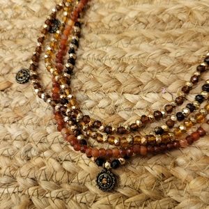 Pretty Cookie Lee necklace with 4 strands in Amber, Bronze and Shiny Gold colors